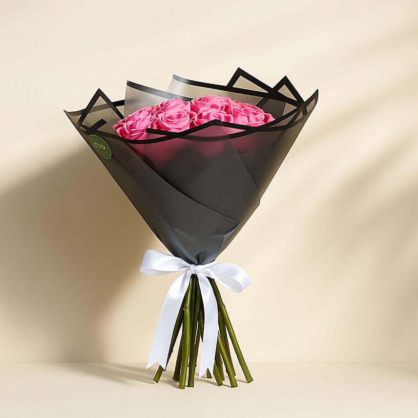 باقة 20 وردة جوري لون وردي غامق في غلاف أنيق باقة 20 وردة جوري لون وردي غامق في غلاف أنيق: أرسل أزهار عيد الميلاد إلى قطر
