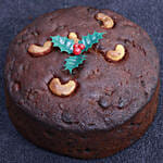 White Poinsettia Plant With Plum Cake