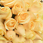 باقة ورد 35 وردة جورية لون مشمشي في غلاف أنيق بني وببيونة