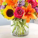 Bright Vivid Bunch Of Flowers In Glass Vase