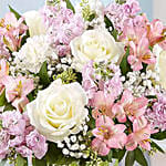 Pink and White Floral Bunch In A Glass Vase