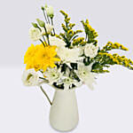 Mix Flowers In A White Handle Vase