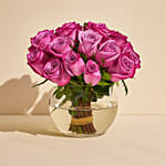 Purple Roses in Glass Bowl