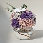 باقة ورد جيبسوفيليا موف ووردي مع أوركيد في فازة