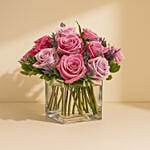 Enchanting Vase Of Royal Purple Roses