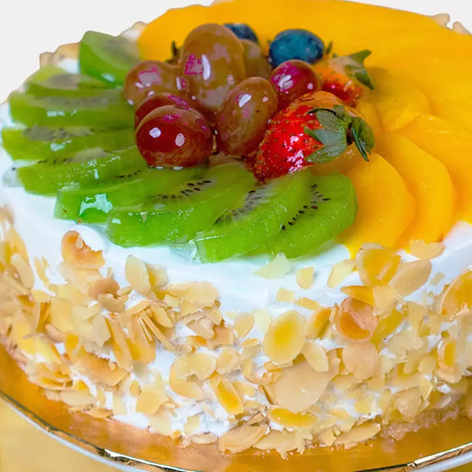 Online Yummy Fruit Cake Half Kg Gift Delivery in Qatar FNP