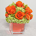Orange Roses Arrangement In Glass Vase