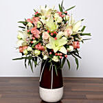 Beautiful White and Peach Flowers In Vase With Cake