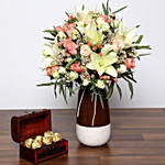 Beautiful White and Peach Flowers In Vase With Rocher