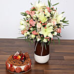 Beautiful White and Peach Flowers In Vase With Cake