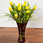 Bright Yellow Tulips In Maroon Vase