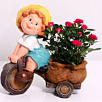 Lavish Rose Plant in Baby Cart Pot