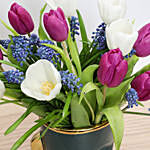 Tulips and Muscari in a Vase