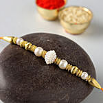 Divine Golden Pearl Thread Rakhi With Almonds