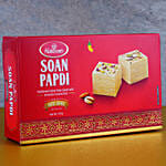 Elegant Golden Peacock Rakhi And Soan Papdi