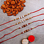 Four Pearl Thread Rakhis And Almonds