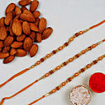 Golden Red Thread Rakhi With Almonds 100 Gms
