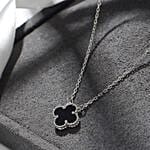 Black four leaf clover necklace and earrings set