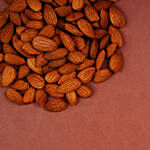 Orange Pearl And Lumba Rakhi Set With Healthy Almonds