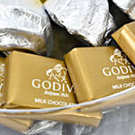 هدايا شوكولاتة جوديفا البلجيكية في وعاء كروي زجاجي
