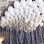 100 white balloons