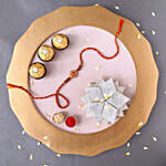 Sneh Traditional Om Rakhi with 250 Grams Kaju Katli and 3 Ferrero Rocher