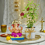 Ganesha Idol and Tulsi plant