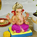 Ganesha Idol and Tulsi plant