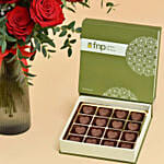 12 Red Roses in Premium Vase And Chocolates