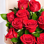 ورد عيد الحب - باقة 12 وردة جوري أحمر  في غلاف بيج