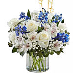 Blue and White Flower Arrangement With Balloons