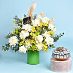 Green and White Flowers Arrangement and Chocolate