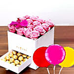 كومبو أزهار وردية في صندوق فاخر مع شوكولاتة فيريرو وبالونات