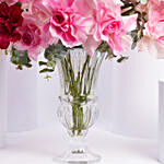باقة من 50 وردة وردية في مزهرية زجاجية رائعة