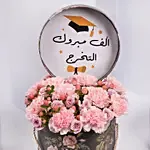 بوكس ورد مبروك التخرج قرنفل وردي بتنسيق جميل