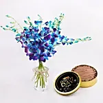 مزهرية الاوركيد مع كيك عيد ميلاد