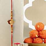 Long Trunk Bal Ganesha Pearl Rakhi For Kids And Motichoor Ladoo