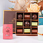Divine Rudraksh Rakhi In Gift Box With Chocolates And Floral Arrangement