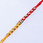 Red And Yellow Fancy Rakhi And 24 Pcs Ferrero Rocher