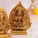 Metal Laxmi Ganesha Idol with Leaf Backdrop