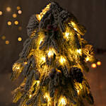 شجرة الكريسماس صناعية مع زينة ثلج