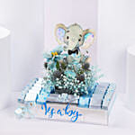 شوكولاتة بالحليب في طبق تقديم أنيق للمولود الصبي