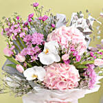 هدايا المولود الجديد بنت كومبو بالونات لون وردي مع باقة ورود