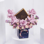 باقة ورد عيد ميلاد مع شوكولاتة بلجيكية