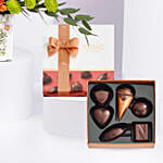 مزهرية أقحوان عيد الميلاد مع بوكس شوكولاتة