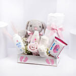 هدايا مولود جديد لون وردي وأبيض مع تيدي أرنب