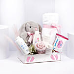 هدايا مولود جديد لون وردي وأبيض مع تيدي أرنب