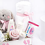 هدايا مولود جديد لون وردي وأبيض مع تيدي أرنب