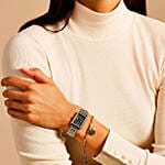 مزهرية أوركيد مع طقم مجوهرات نسائي من فوسيل