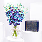 مزهرية أوركيد مع طقم مجوهرات نسائي من فوسيل